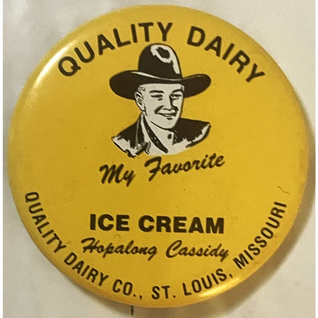 Yellow Hopalong Cassidy pin promoting Quality Dairy ice cream with cowboy illustration