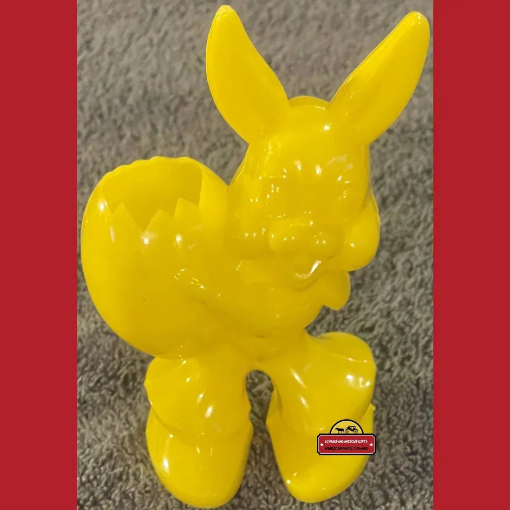 Bright yellow balloon rabbit candy holder sculpture perfect for Easter joy and decor