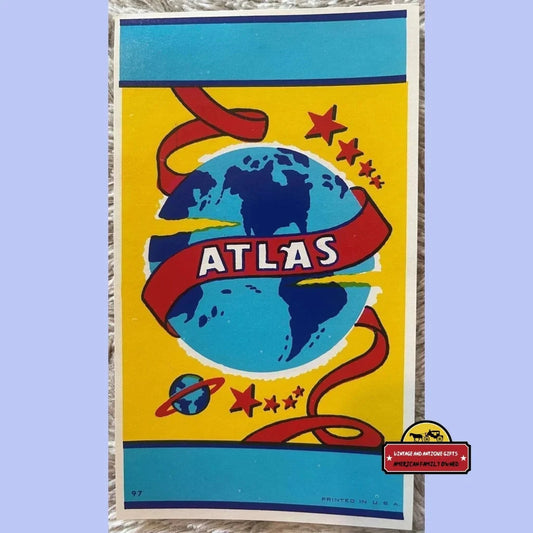 Colorful vintage atlas broom label poster with globe, red ribbon, and stars for nostalgia