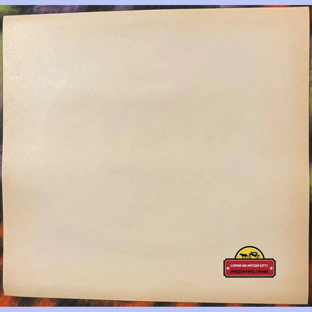 Blank beige canvas featuring a colorful grape soda label in the corner