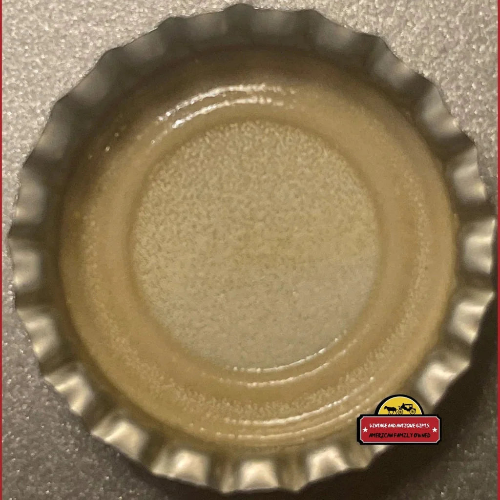 Top view of a bottle cap with ridged edges from the Rare Antique Vintage Grapefruit