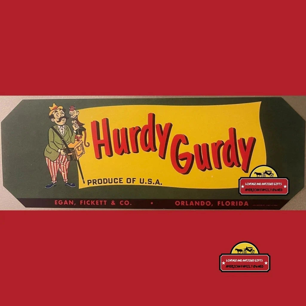 Vintage Hurdy Gurdy crate label with a playful monkey from Orlando, Florida