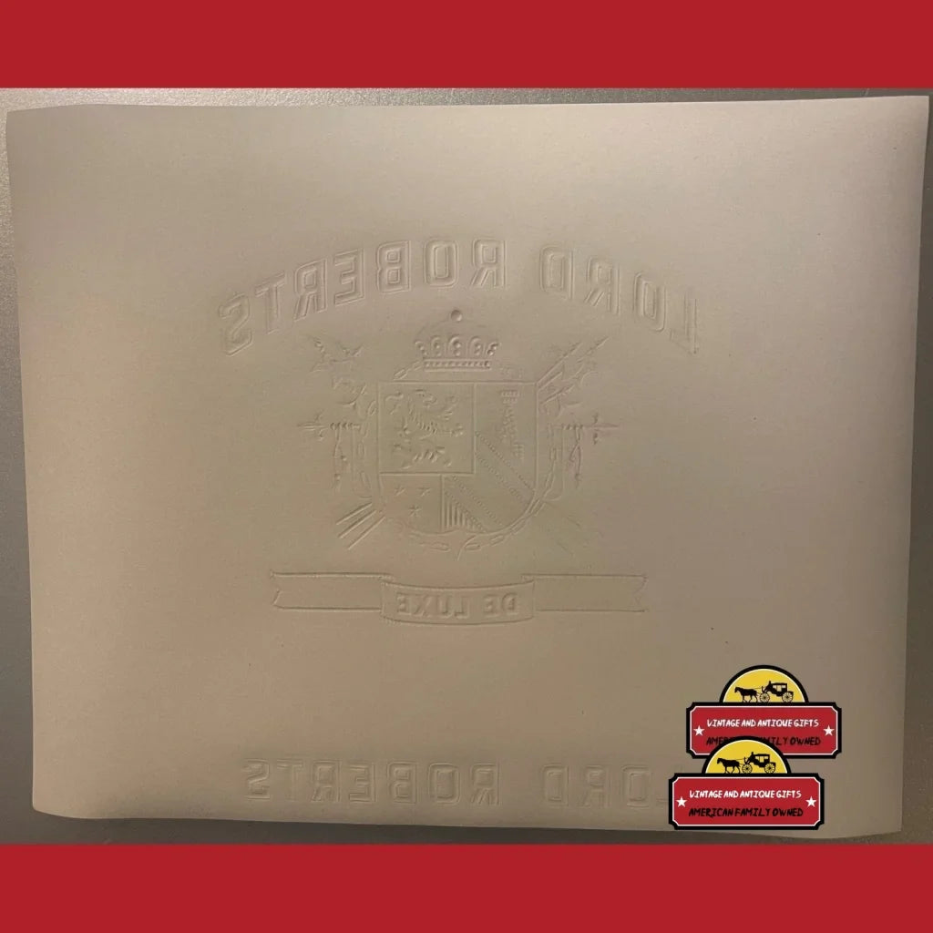 Embossed white foam takeout container featuring Lord Roberts logo and red stickers