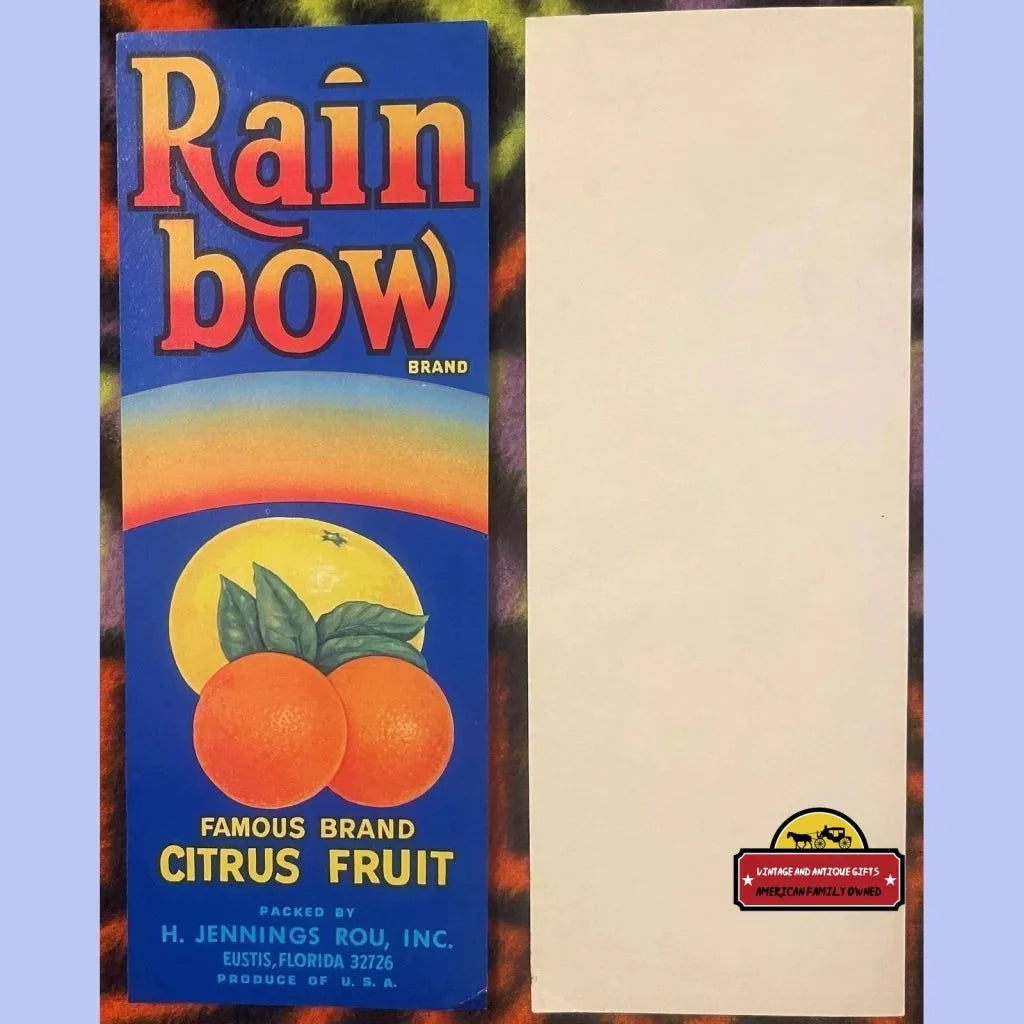 Vintage Rainbow crate label with colorful text and an orange from Eustis Florida