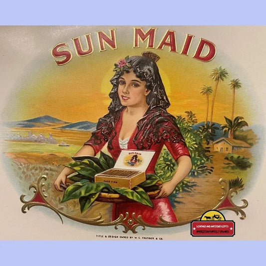 Vintage Sun Maid Raisins poster with woman in Spanish dress for embossed cigar label