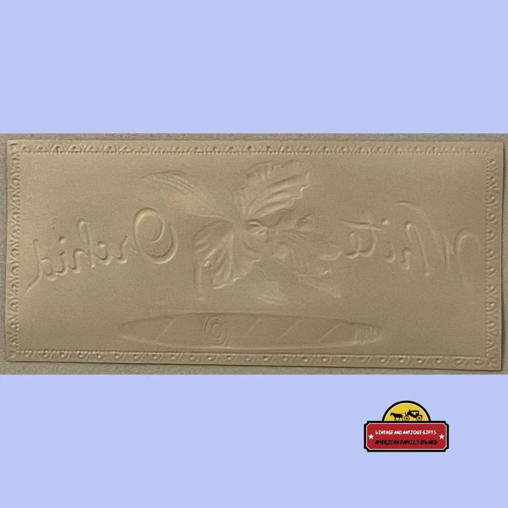 Embossed mold of an Antique Vintage White Orchid chocolate bar with floral design