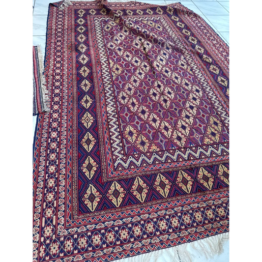 Rich burgundy traditional rug with MLB career floral patterns