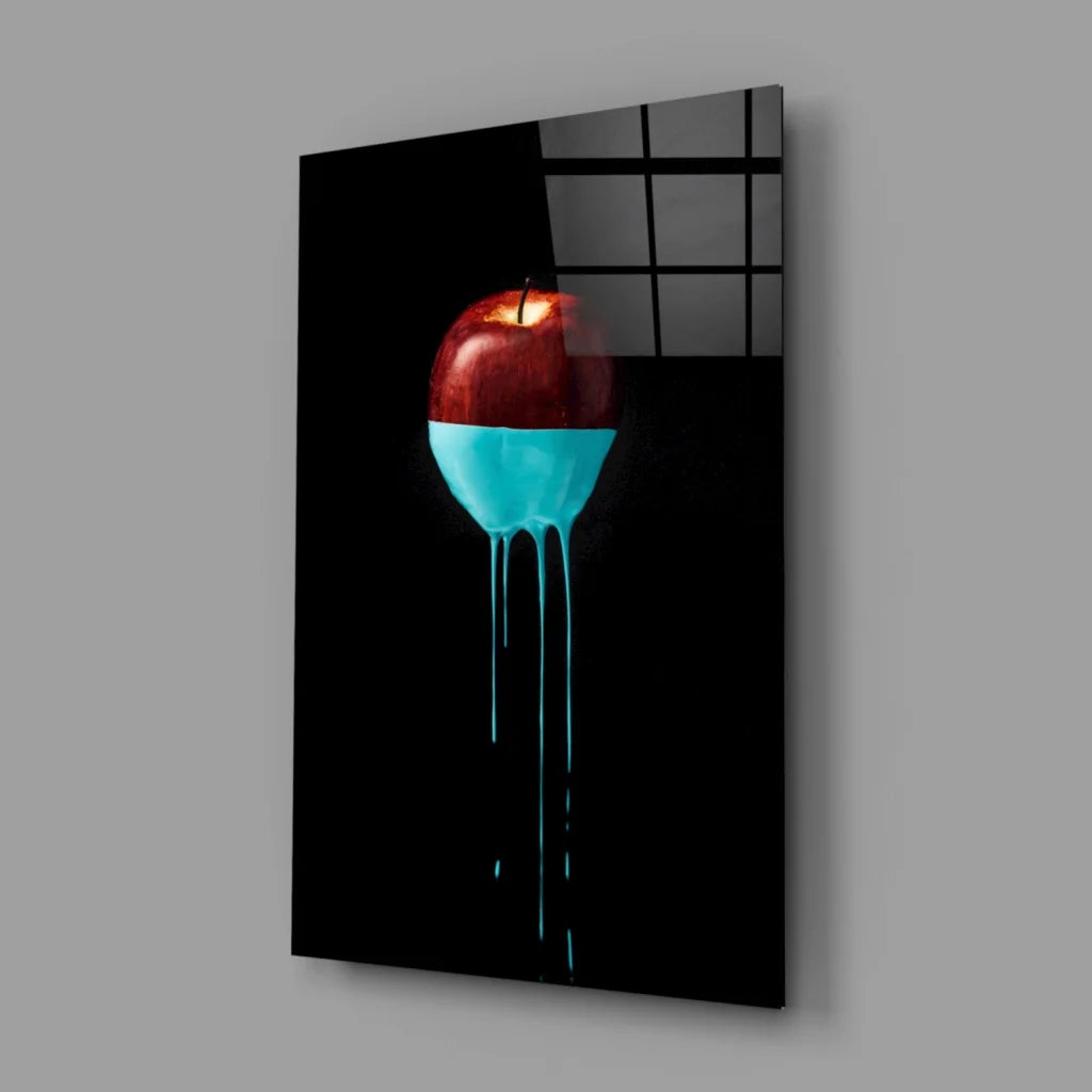 Glossy red apple with turquoise liquid on glass wall art