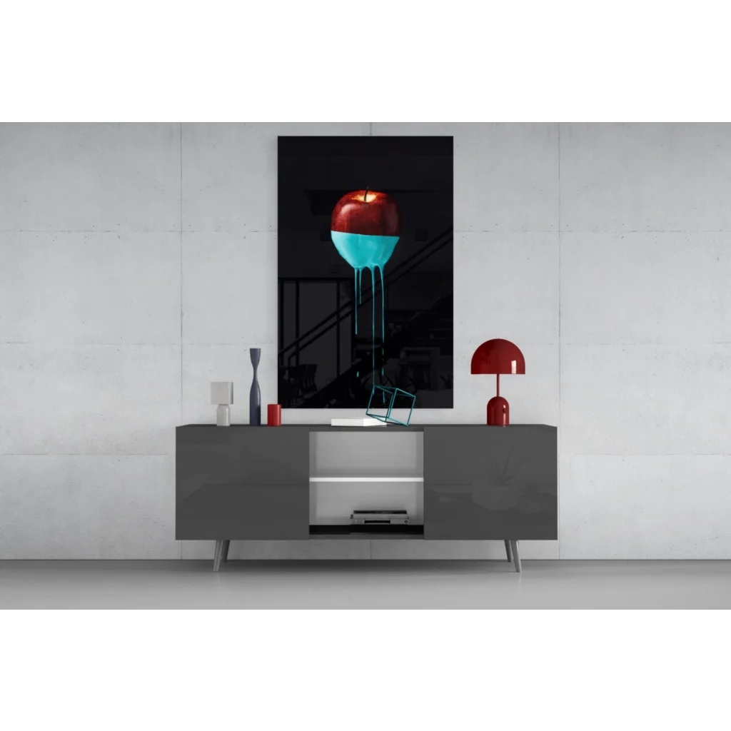 Stunning glass wall art of red apple with turquoise drip on black frame