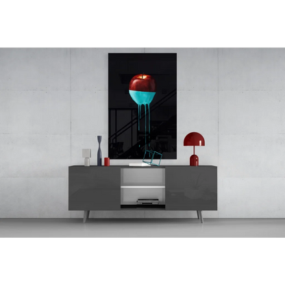 Stunning glass wall art of red apple with turquoise drip on black frame