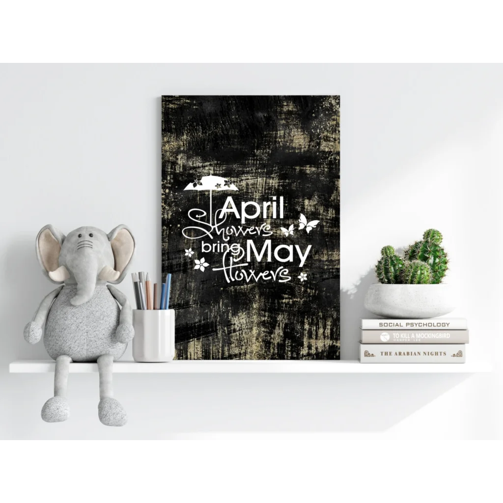 Black and white April Showers Bring May Flowers aluminum wall art with cursive script and floral butterflies