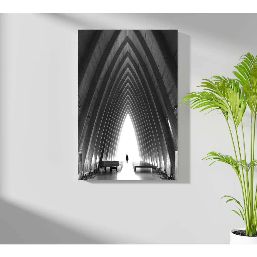 Black-and-white arched corridor with dramatic perspective and piano