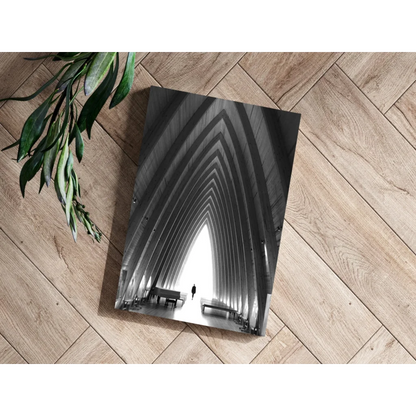 Black-and-white arched corridor aluminum print with dramatic perspective