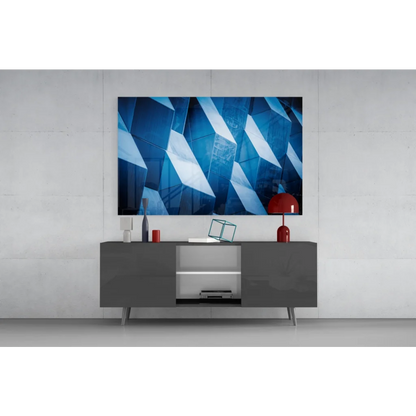 Stunning blue geometric glass wall art hanging on modern wall