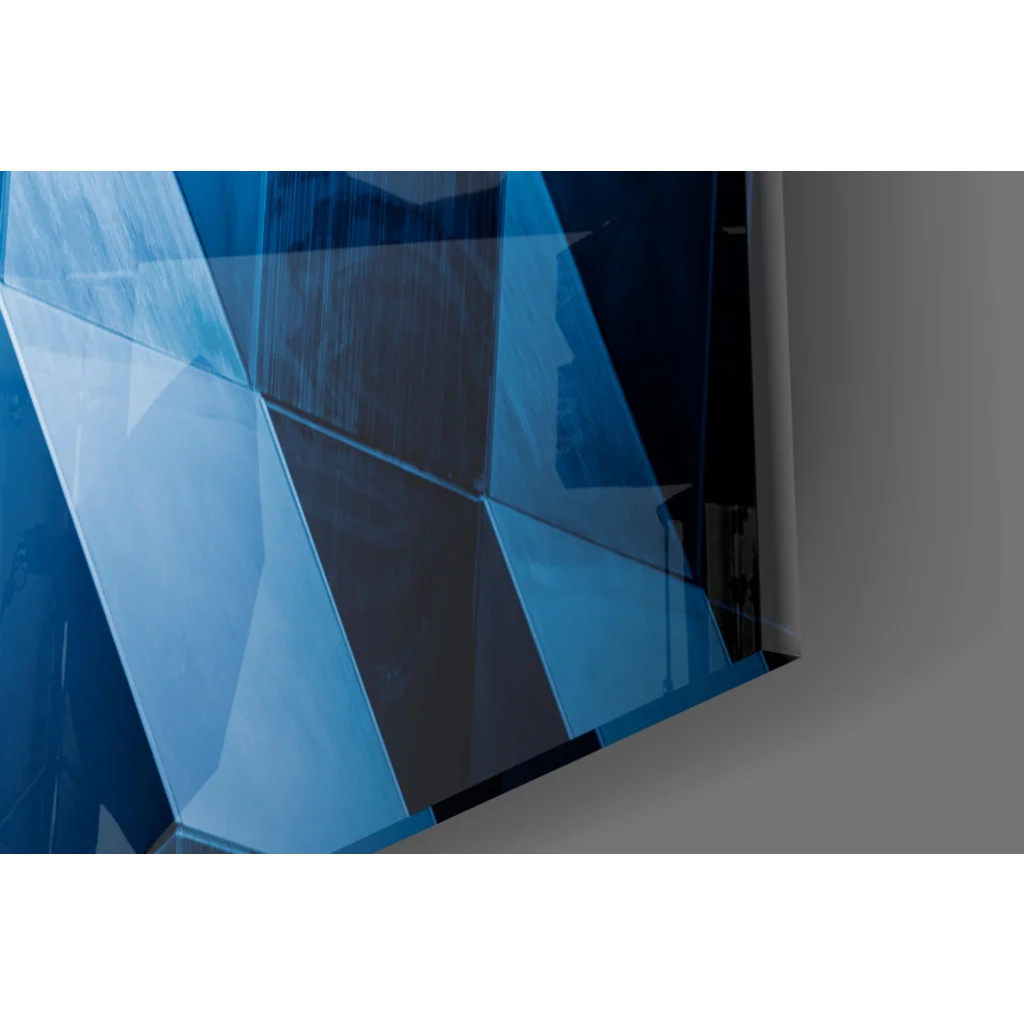 Modern blue geometric glass wall art with bold shapes and glossy finish
