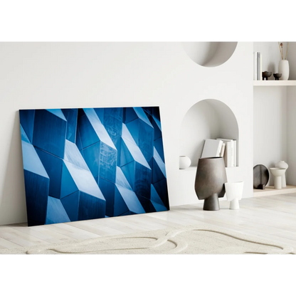 Stunning blue geometric glass wall art leaning on white wall