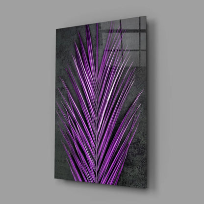 Vibrant purple palm leaf glass wall art on dark textured panel