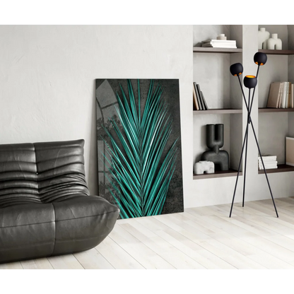 Vibrant teal palm leaf glass wall art on white wall