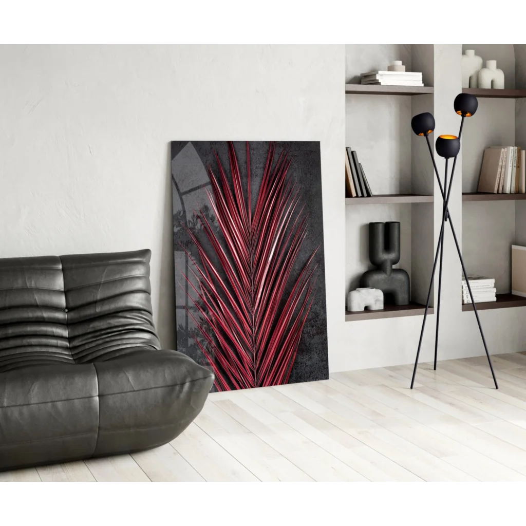 Stunning red palm glass wall art with metallic shine on gray wall