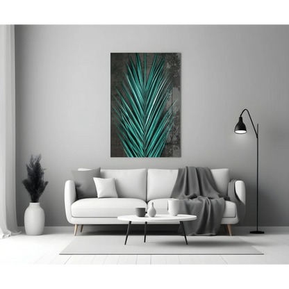 Vibrant teal palm leaf glass wall art on gray wall