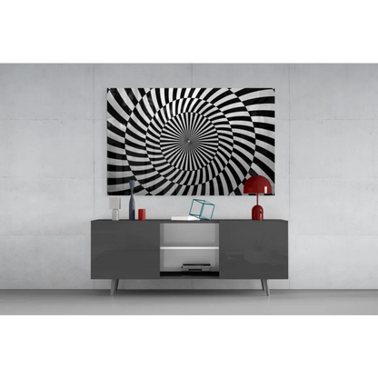 Hypnotic black and white spiral glass wall art with bold stripes