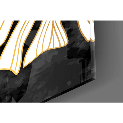 Black and gold abstract wall art with white wing shapes and textured monstera leaf