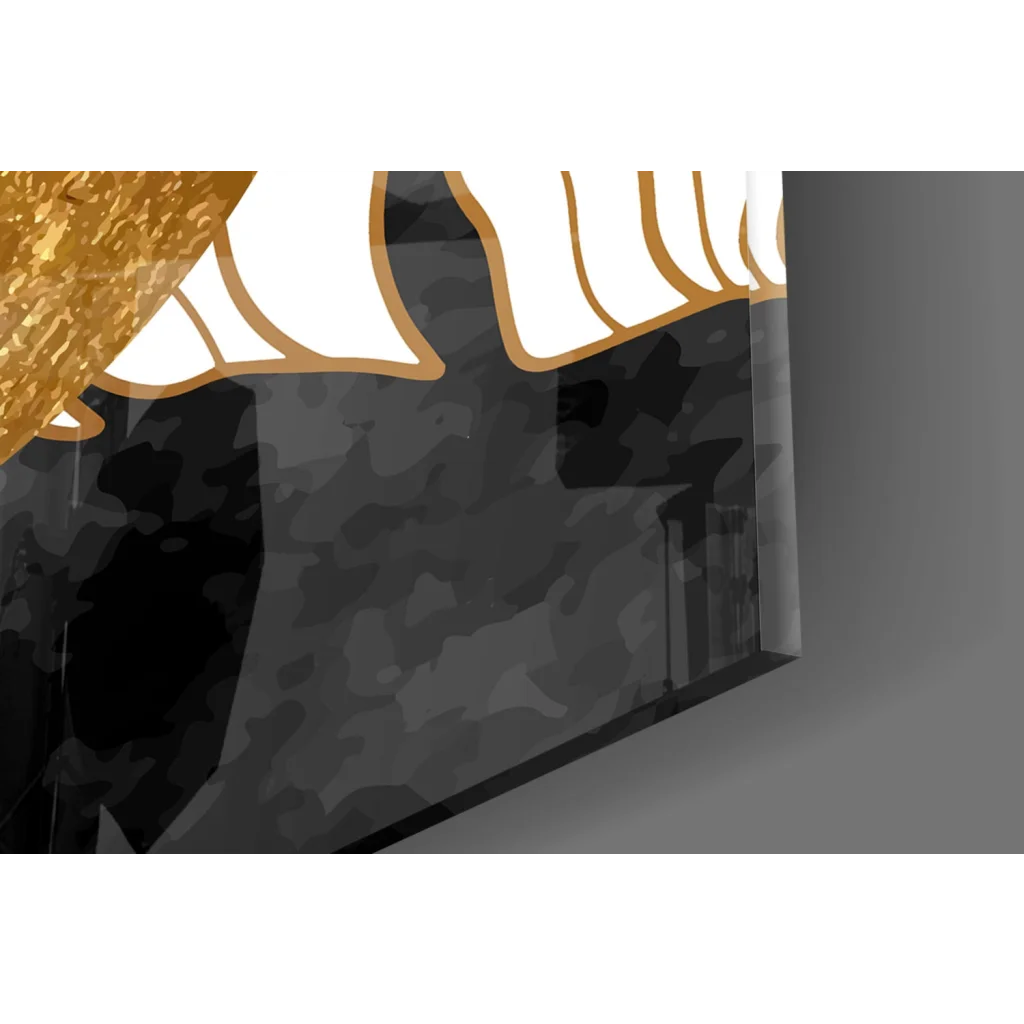 Sleek golden monstera leaf glass wall art with textured circle accent