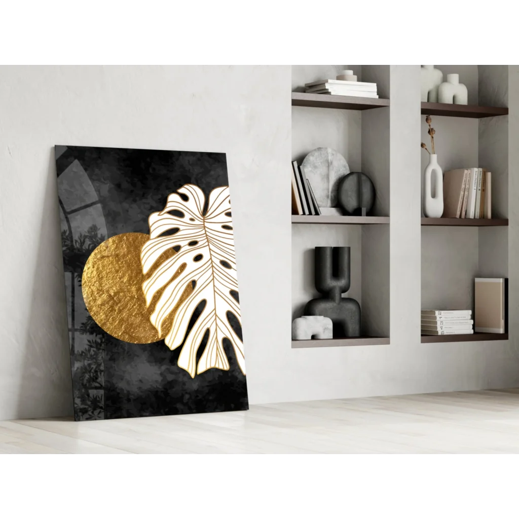 Black and gold monstera leaf wall art with textured circle
