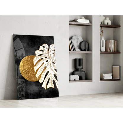 Black and gold monstera leaf wall art with textured circle