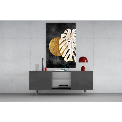 Black and gold monstera leaf wall art with textured circle