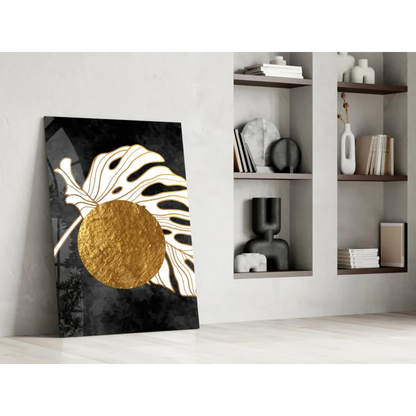 Golden Monstera Leaf Glass Wall Art with textured black and gold circle