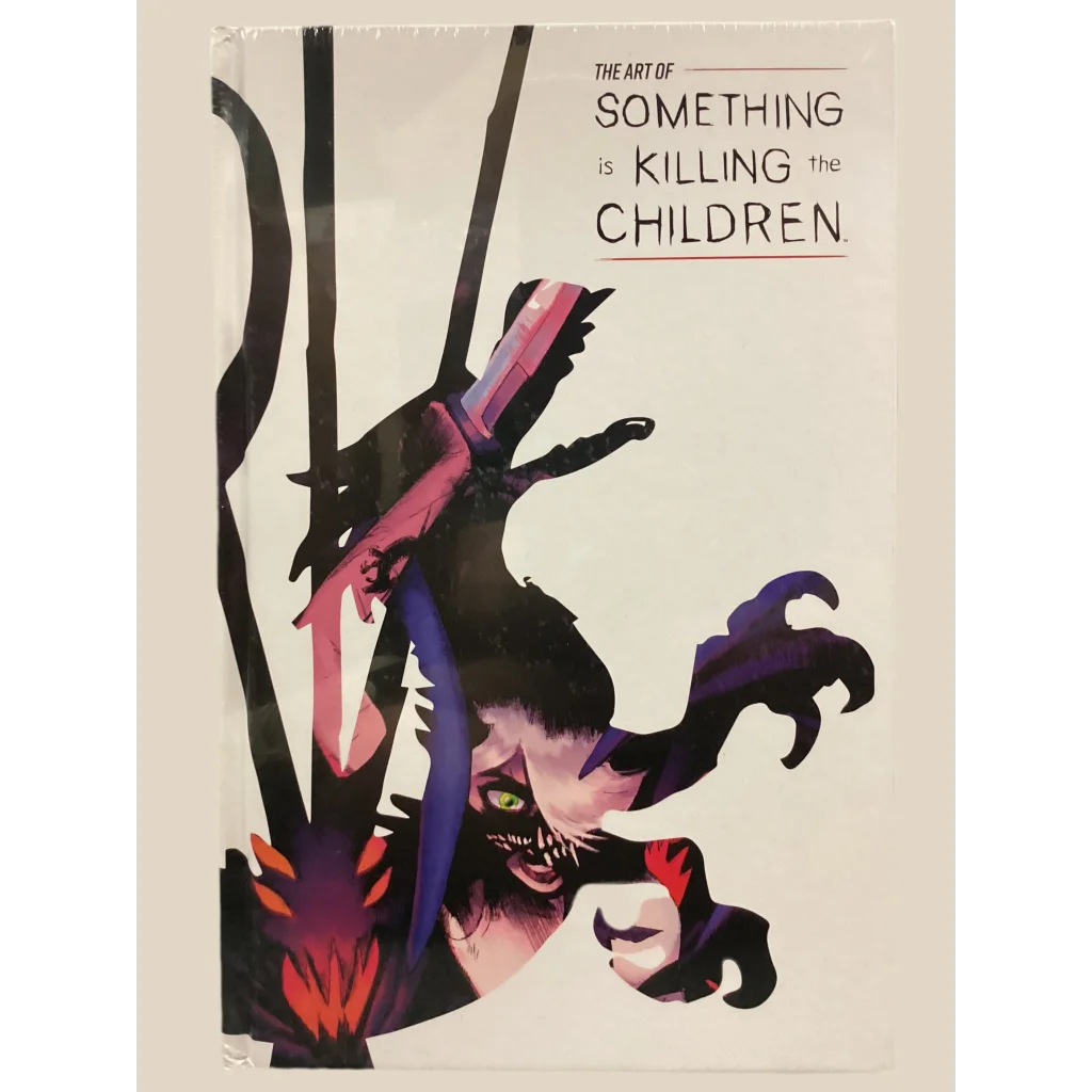 Art book with a dramatic cover featuring a monster and a figure with a blade