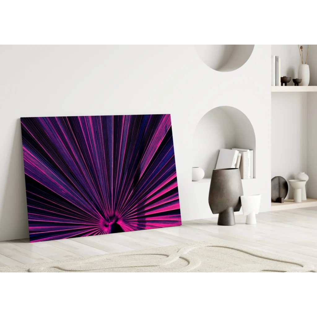 Vibrant purple pink radial burst glass wall art on white wall