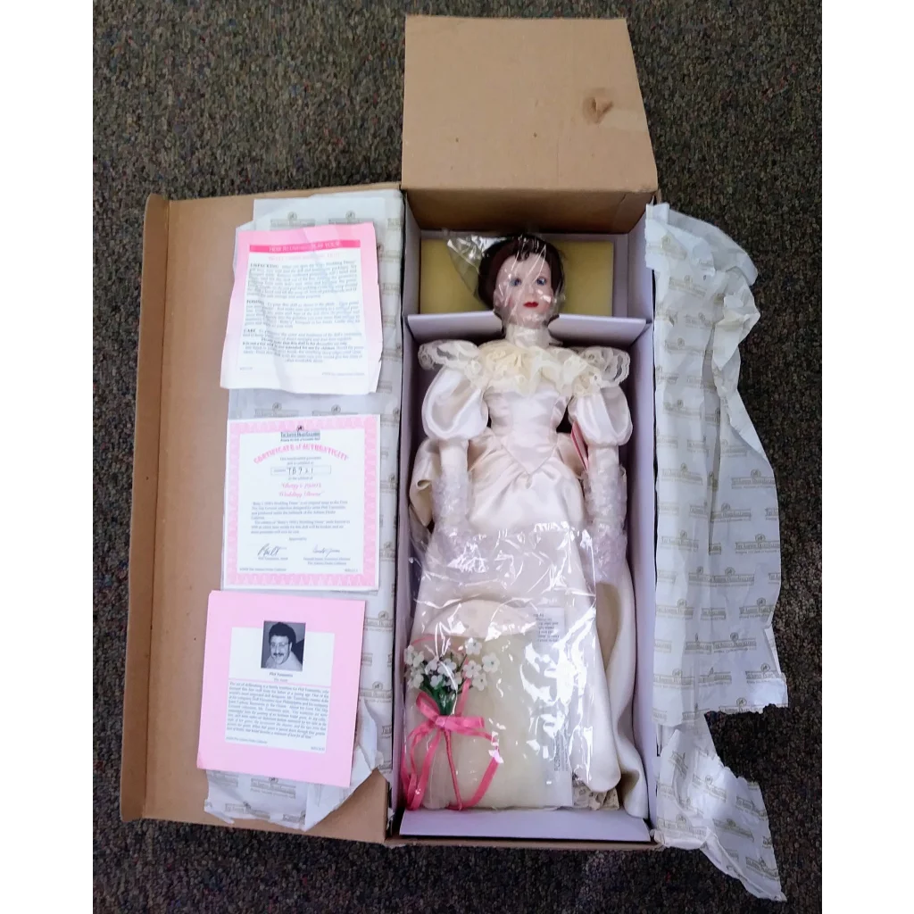 Stunning 1930s porcelain wedding doll in white floral dress by Ashton Drake Galleries