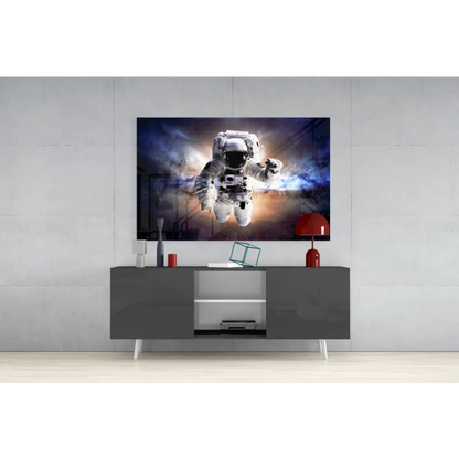 Black and white astronaut wall art on vibrant cosmic canvas
