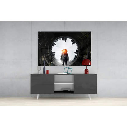 Black and white astronaut glass wall art with glowing orange helmet and cityscape tunnel