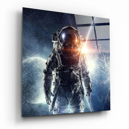 Sleek silver astronaut in glass wall art against starry cosmos