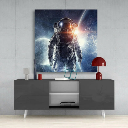 Stunning black-and-gray astronaut glass wall art print with cosmic backdrop