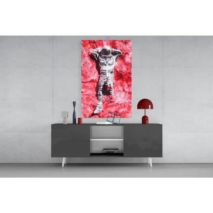 Vibrant red canvas wall art of black-and-white astronaut in fiery texture