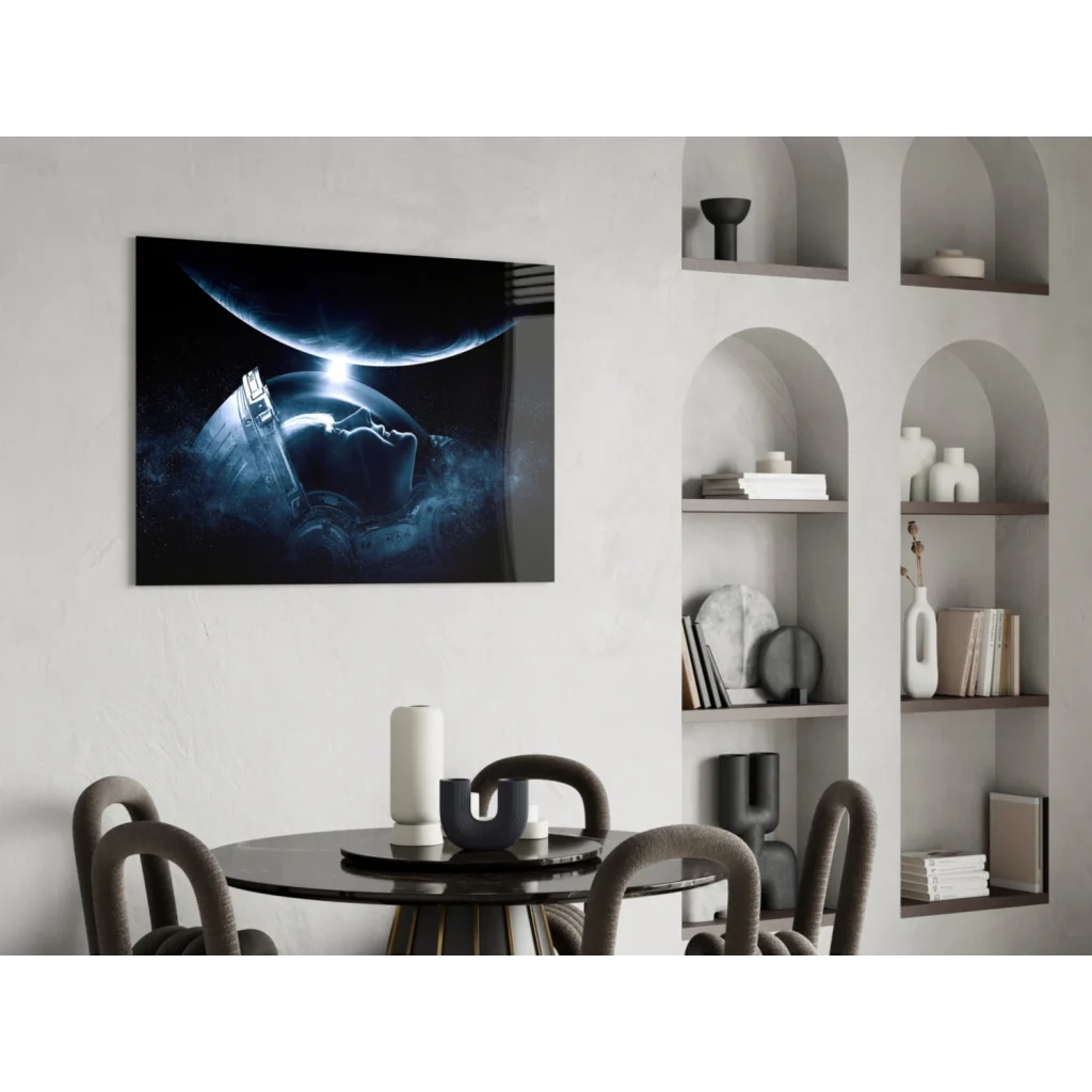 Sleek black framed canvas wall art of astronaut and glowing planet