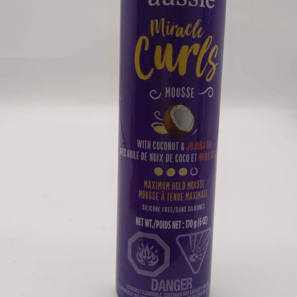 Aussie Miracle Curls Mousse 6 oz purple can with gold lettering