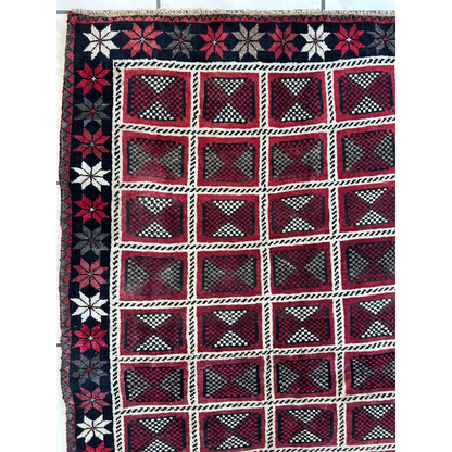 1980s Persian Lori nomadic carpets with red geometric patterns and floral borders