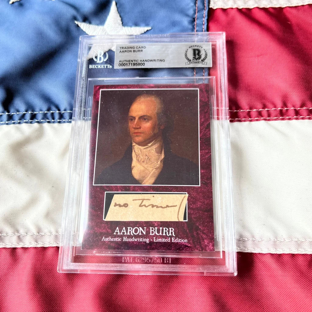 A framed authentic aaron burr trading card with portrait, handwritten signature on cream label, maroon textured background in burr words graded historical collectible set