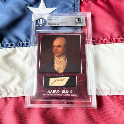 A framed authentic Aaron Burr trading card with portrait and handwriting in a clear Beckett slab from burr words graded set