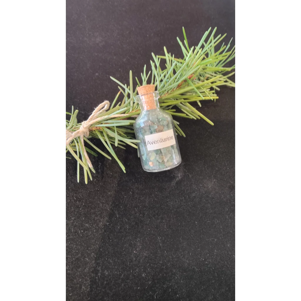 Authentic Brazilian gemstone bottle with aventurine stones and pine branches