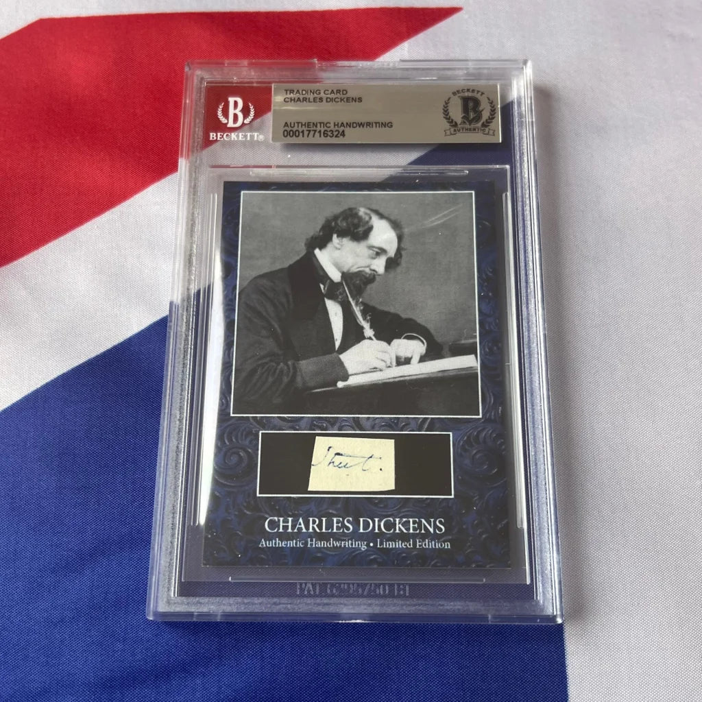 A graded trading card of Charles Dickens showing his authentic handwriting for Dickens Wrote