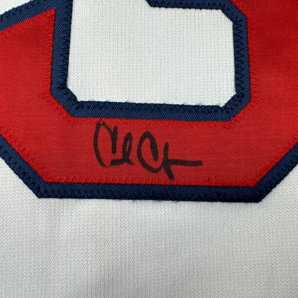 Autographed red and white custom jersey from a professional sports league
