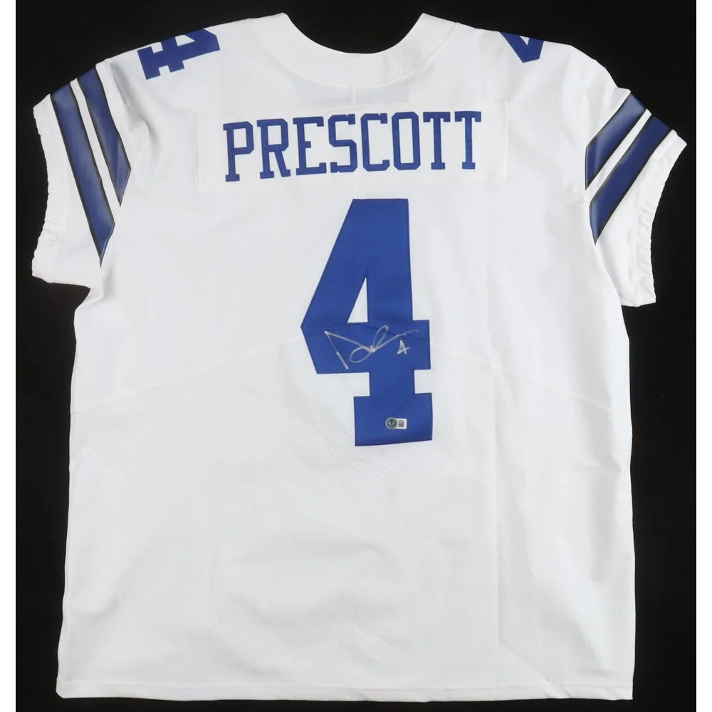 White Dallas Cowboys Dak Prescott jersey with blue numbers and signature, authentic signed memorabilia