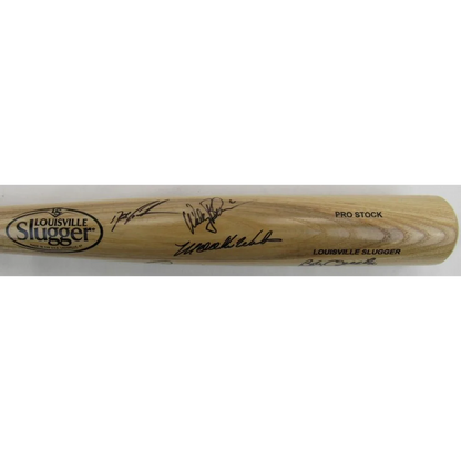 Light-colored Louisville Slugger baseball bat signed by Doc Gooden with multiple signatures