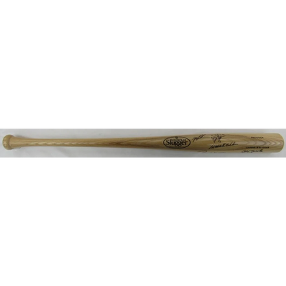 Light-colored Louisville Slugger baseball bat signed by Doc Gooden for collectors
